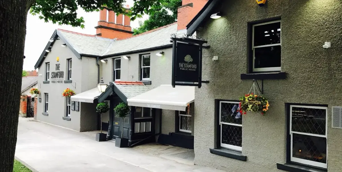 Two men charged over attack in gents’ toilets at Bowdon pub