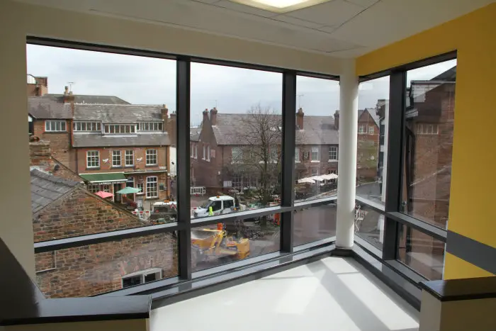The floor to ceilling windows clearly show the proximity to the town centre
