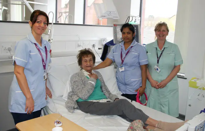 Patient Margaret with staff in the renal dialysis unit