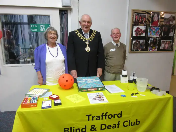Chairwoman Doreen Webster (left) with the mayor and a member