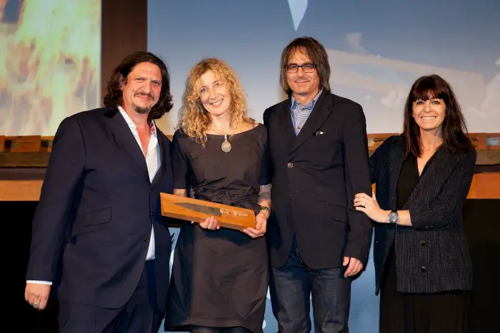 Jen Thompson and Nick Johnson receive their Observer Food Monthly award from food critic Jay Rayner and host Claudia Winkleman