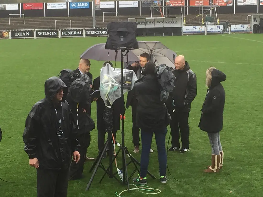 Lee Sinnott is interviewed by the BT Sport cameras at a wet Bromley