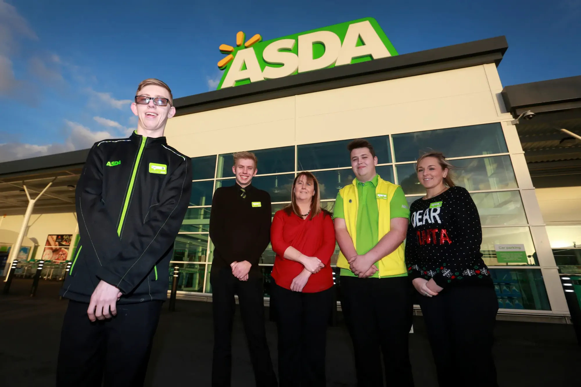 Asda new recruit Tom Stephens (left) with colleagues Kane Stephenson and Sophie Rutherford, Ingeus's Natalie Burney and fellow new recruit John Moseley