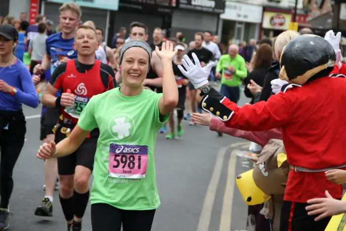 Action from last year's marathon as it passed through Timperley