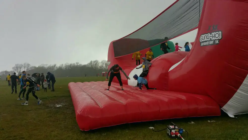 The mums and kids battle away in the awful conditions