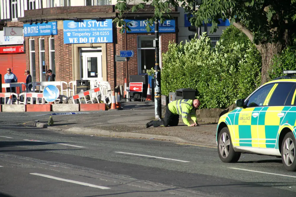 Police conducting investigations at the scene of Monday evening's collision