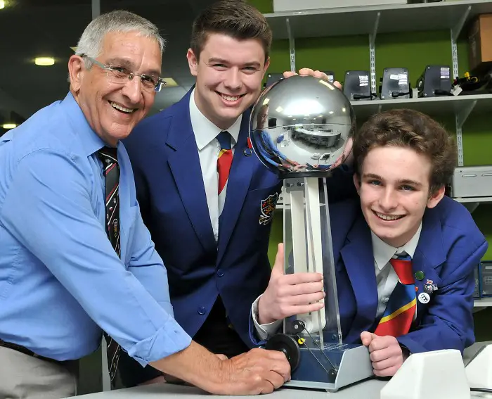 Azzopardi (left) with sixth form students Sam Anderson and Shane Fox and the school's Vandergraph Generator 