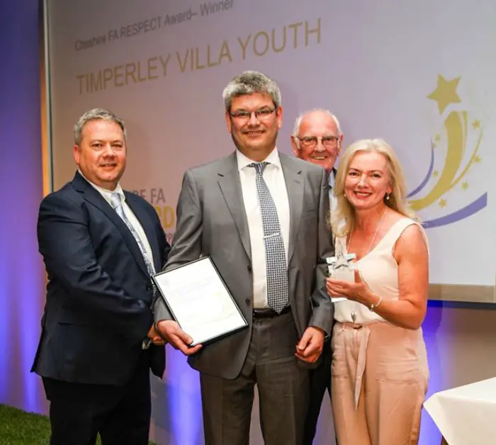 Andy Gorman, Steve Sadler and Sheila Saddington receiving the Cheshire FA Respect & Fair Play Club Award from Terry Clare (left) of the Cheshire FA