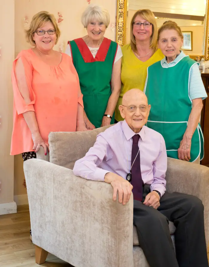 Victor with staff at Orchard Court in Timperley