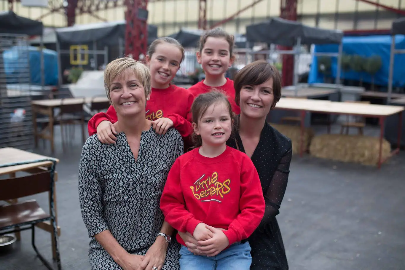 Tina and Claire with some of the Little Belters singers at Altrincham Market