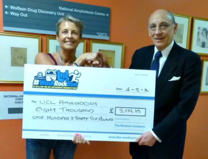 Lesley Toft presenting the cheque on behalf of the company to Professor Sir Mark Pepys at The National Amyloidosis Centre in London  