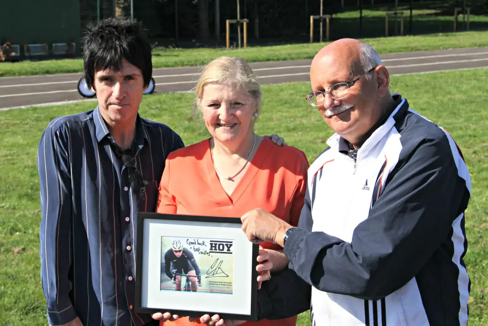 Marr with headteacher Hilary Moon and the building's architect, together with a message of support from Olympic champion Sir Chris Hoy