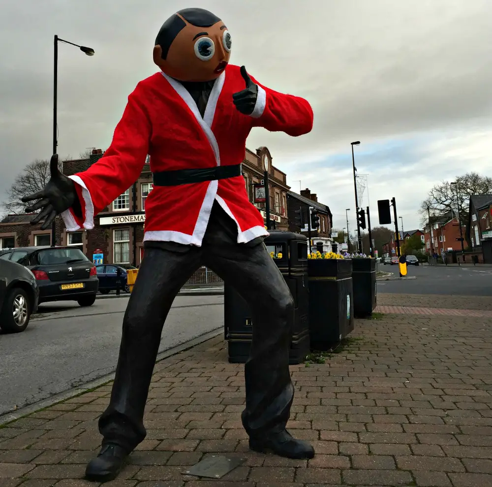 The Frank Sidebottom Statue in Timperley Village last Christmas