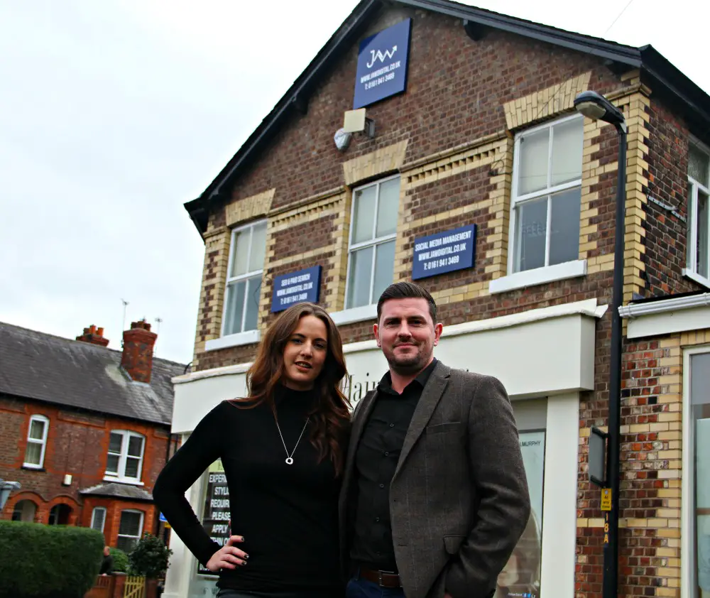 Julaine and Wayne outside their new offices in Altrincham