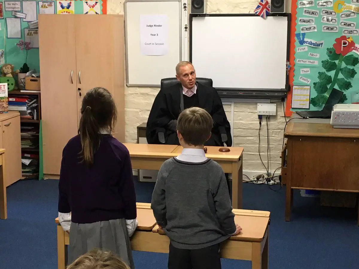 Judge Rinder in his class courtroom at Forest Prep yesterday