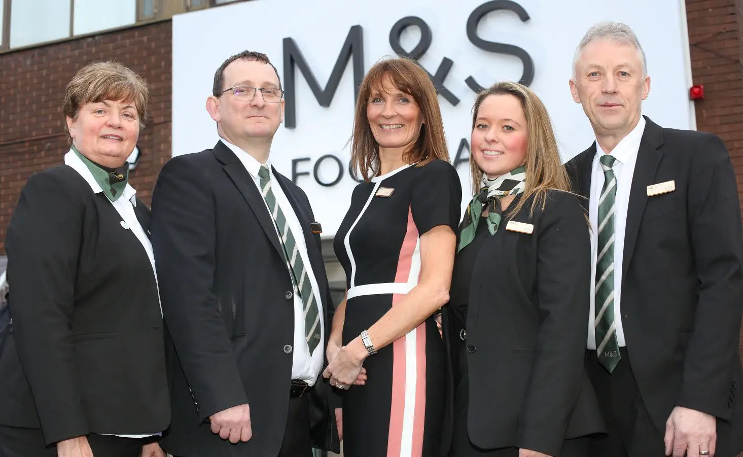 Store manager Liz Rushton with M&S management at the opening today 