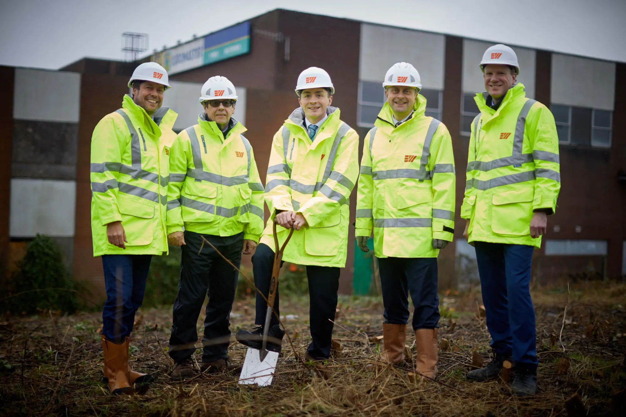 Leader of Trafford Council, Cllr Sean Anstee (centre), on the Altair site this week with (l-r) Nick Payne, MD of Nikal, Peter Barr, Head of Pre-Construction at Eric Wright Group, Jeremy Hartley, MD of Eric Wright Group, and Cllr Alex Williams, Deputy leader of Trafford Council