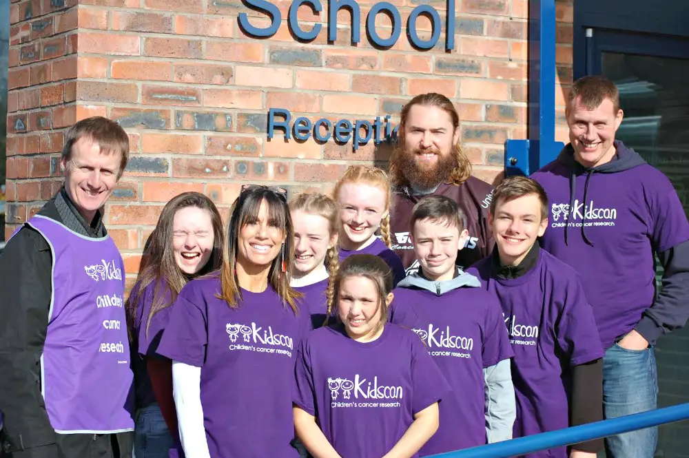 Manchester Storm's Eric Neilson with pupils and staff from Wellington School